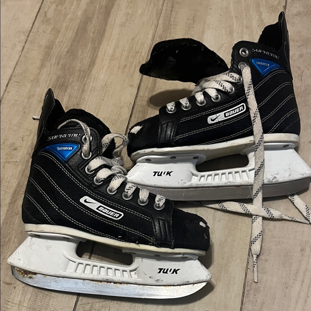 Bauer Black and White Skates with Blue Accents